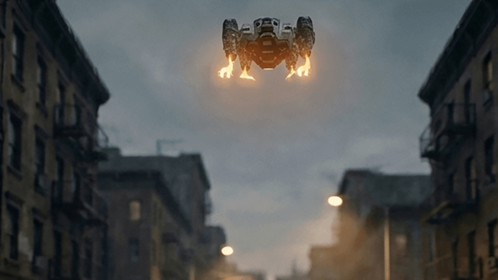 A police drone dropping between two brick rooftops